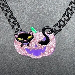 New Betsey Johnson necklace. Halloween Jack O ‘Lantern with a black cat inside
